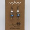Boucles d'oreille Petite Poupée en acier inoxydable.